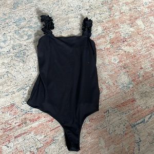 Black ribbed bodysuit with ruffle sleeves 5 for $20